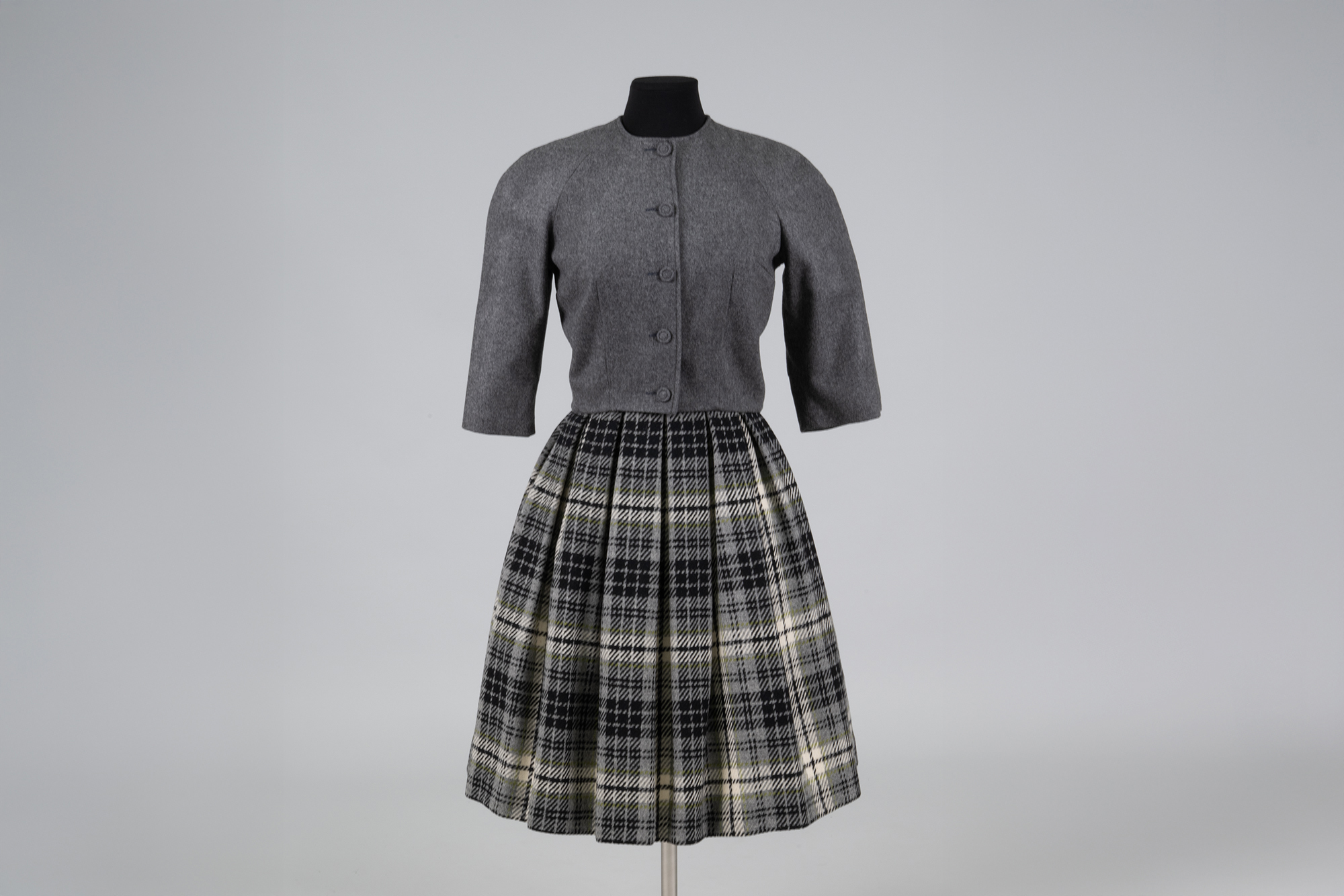 Image of Sailmates jacket and skirt ensemble, modeled in the World's Fair Fashion Pavilion, 1962